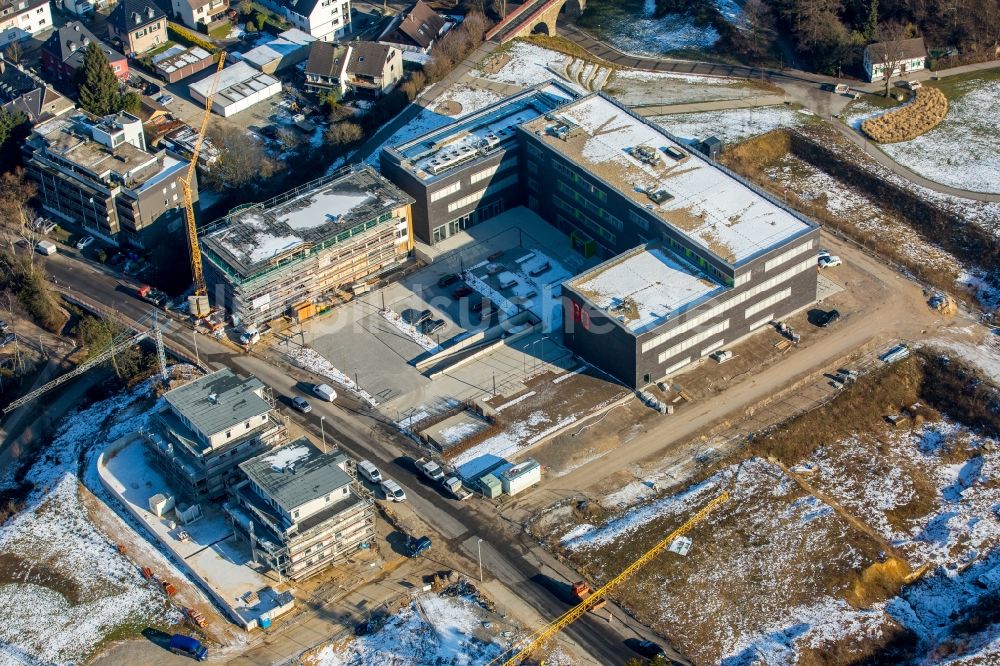 Luftaufnahme Heiligenhaus - Winterluftbild Baustelle zum Neubau einer Mehrfamilienhaus-Wohnanlage Grüner Campus an der Kettwiger Straße in Heiligenhaus im Bundesland Nordrhein-Westfalen