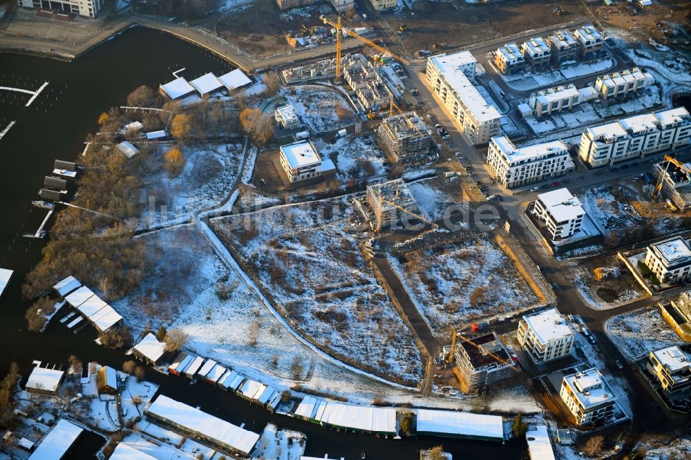 Schwerin von oben - Winterluftbild Baustelle zum Neubau einer Mehrfamilienhaus-Wohnanlage an der Schwaneninsel in Schwerin im Bundesland Mecklenburg-Vorpommern, Deutschland