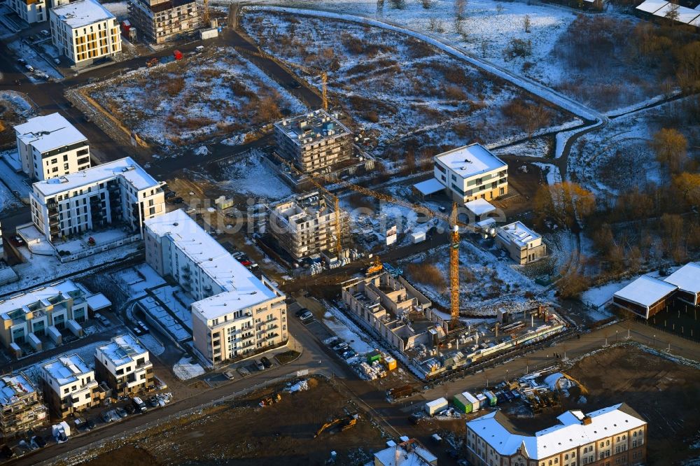 Luftaufnahme Schwerin - Winterluftbild Baustelle zum Neubau einer Mehrfamilienhaus-Wohnanlage an der Schwaneninsel in Schwerin im Bundesland Mecklenburg-Vorpommern, Deutschland