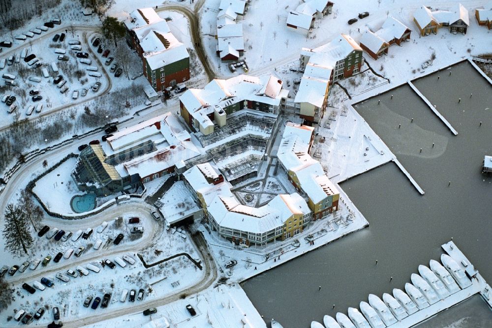 Luftaufnahme Kleinzerlang - Winterluftbild Ferienhaus Anlage Marina Wolfsbruch in Kleinzerlang im Bundesland Brandenburg, Deutschland