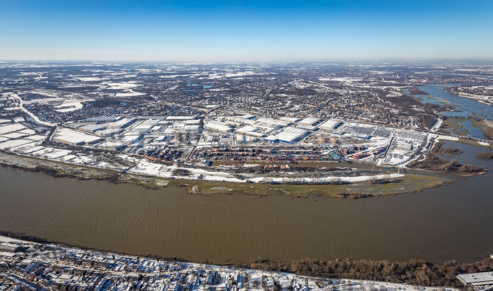 Rheinhausen von oben - Winterluftbild Gewerbegebiet am Flussverlauf des Rhein in Rheinhausen im Bundesland Nordrhein-Westfalen, Deutschland