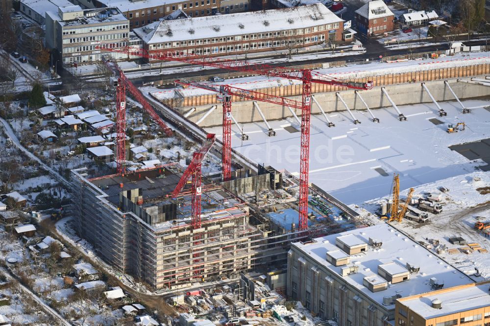 Luftaufnahme Berlin - Winterluftbild Neubau- Baustelle im Gewerbegebiet Gewerbehöfequartier Go West in Berlin, Deutschland