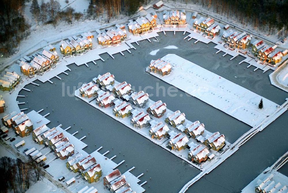 Rheinsberg aus der Vogelperspektive: Winterstimmung im Hafendorf Rheinsberg