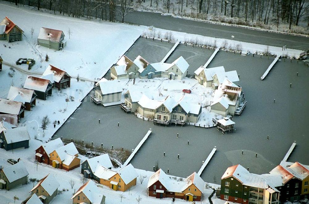 Rheinsberg aus der Vogelperspektive: Winterstimmung im Hafendorf Rheinsberg